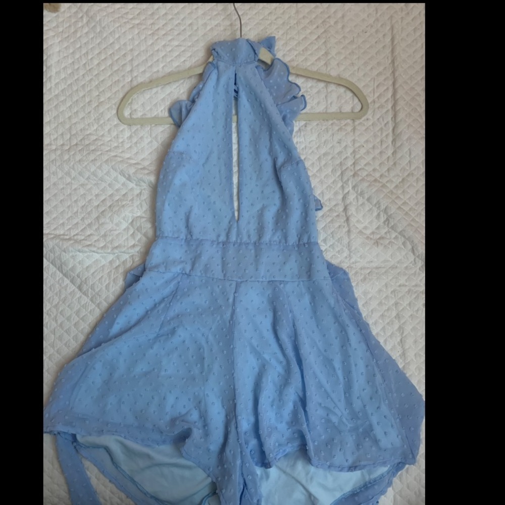 Baby blue romper from Lucy in the sky.